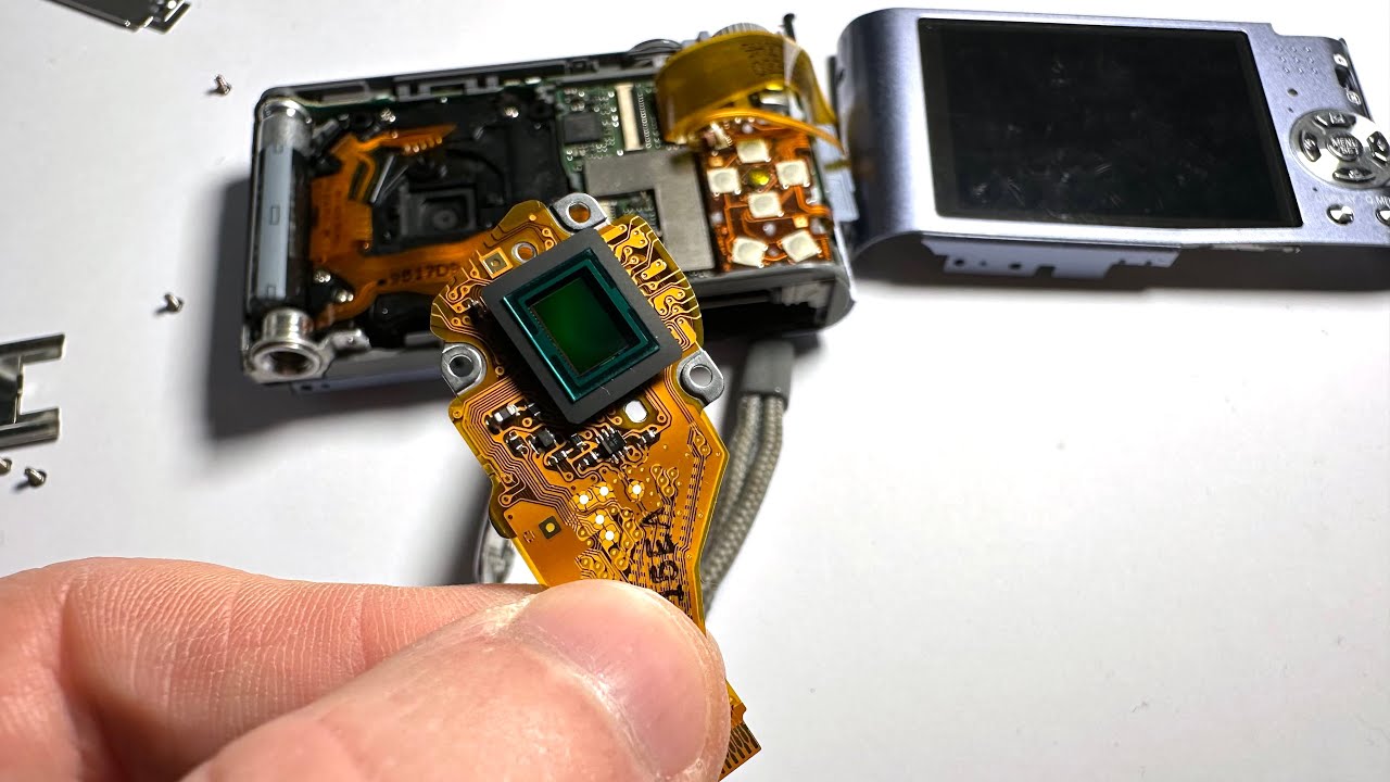 Panasonic Lumix compact camera cleaning the CCD sensor in the lens