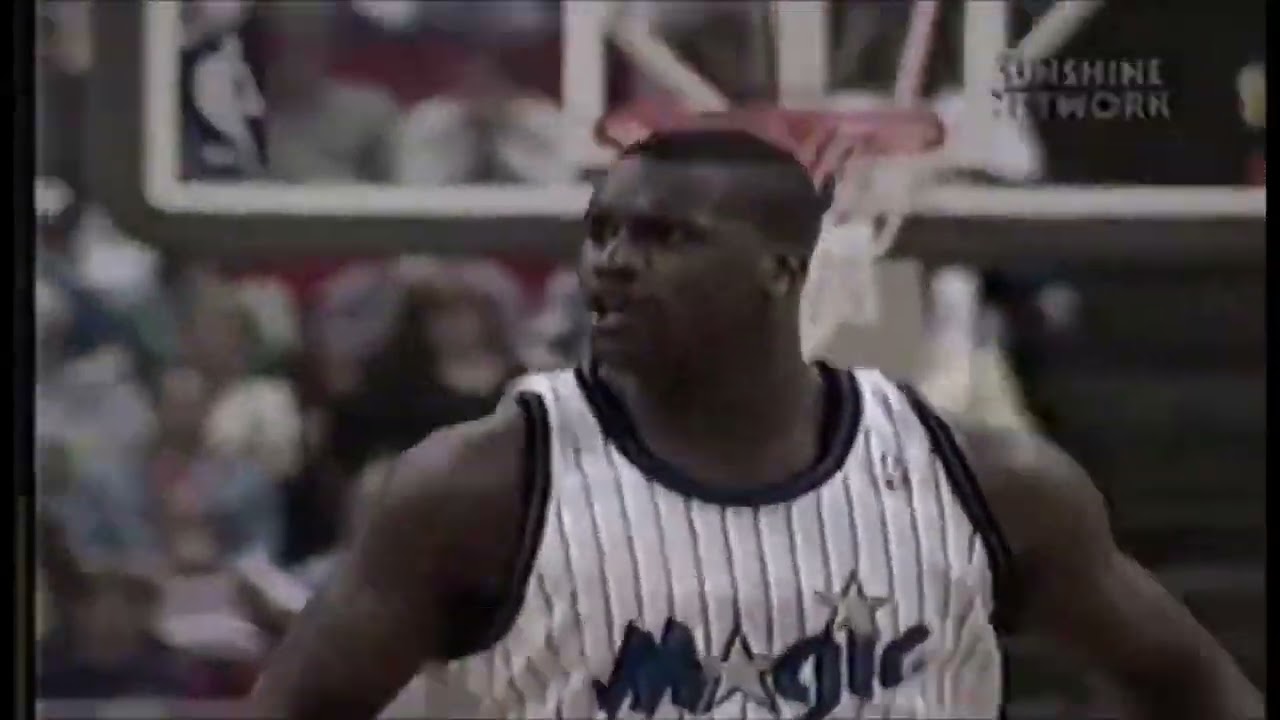 Shaq punches Eric Montross in the throat, then get pushed down by Sherman Douglas 1995