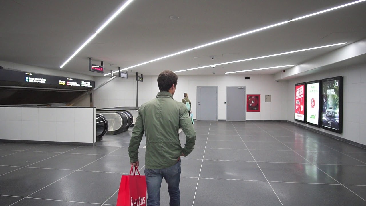 Sweden, Stockholm City train/subway station,  2X elevator, 1X escalator - going down to platform