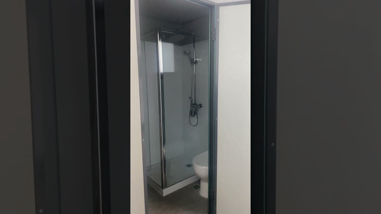 Portable bathroom unit with laundry shower toilet