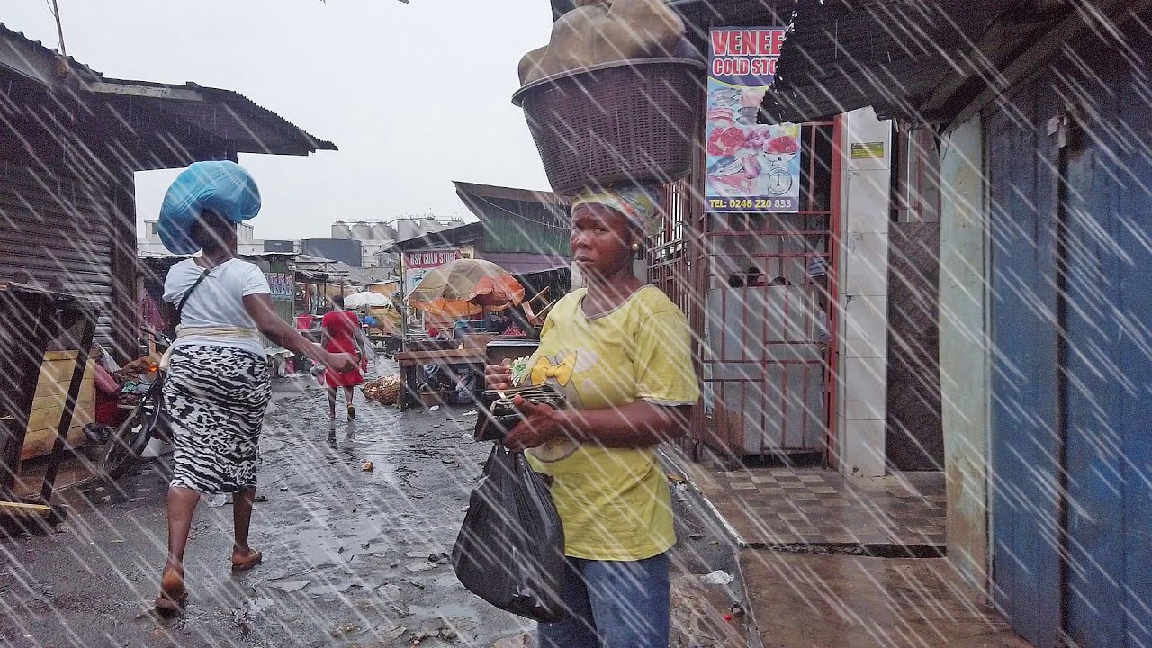 HEAVY RAIN FOR HOURS IN LOCAL GHANA MARKET MAKOLA, AFRICA