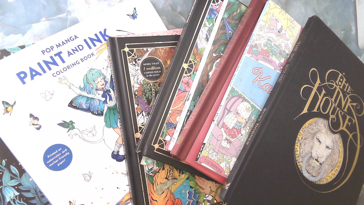 Quick showing of ninety of my coloring books. Three wood crates and I have three more. (90/?)