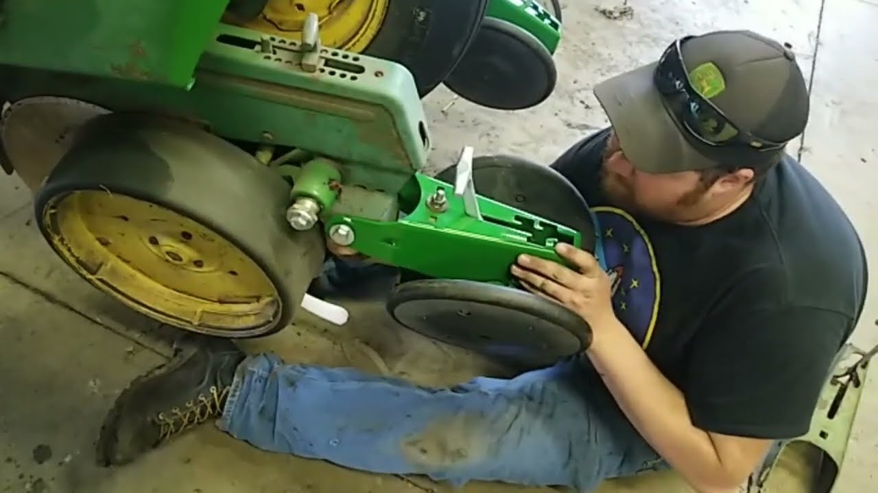 John Deere 7000 corn planter firming wheels/Dad Strengthens tattoos