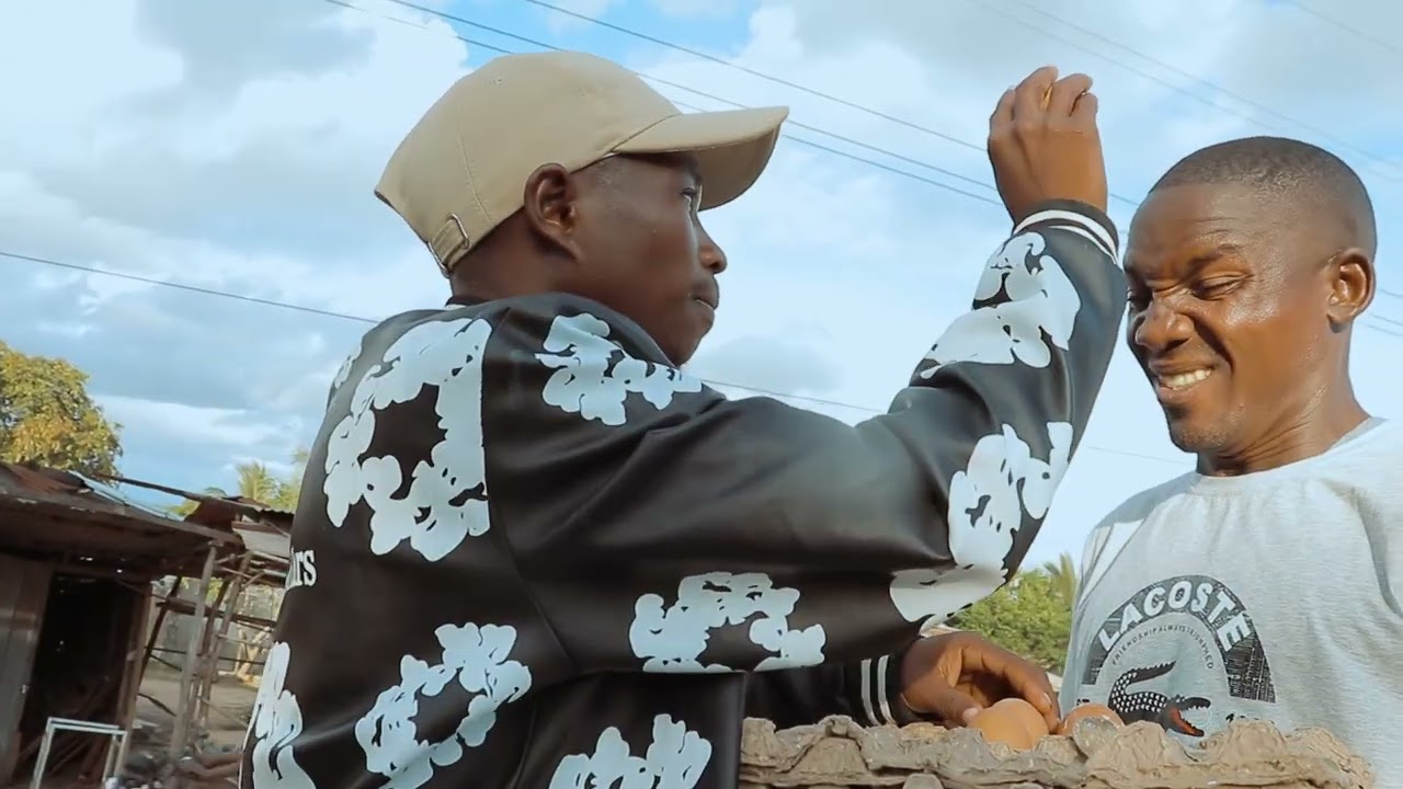OBÁSICO LAMINE KAHANA AMOR VIDEO BY THE SOUSA