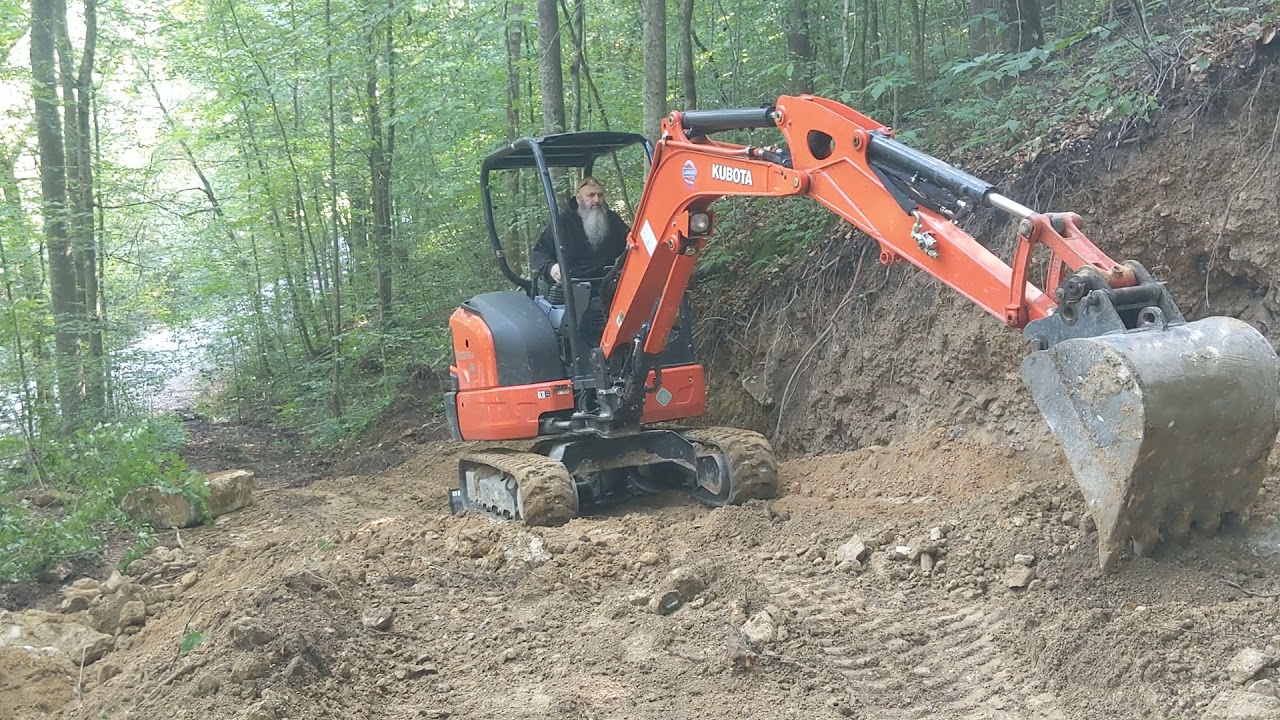Moving boulders with the Kubota kx033-4!
