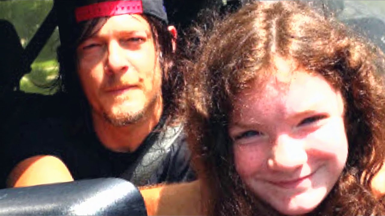 Norman reedus with his fan