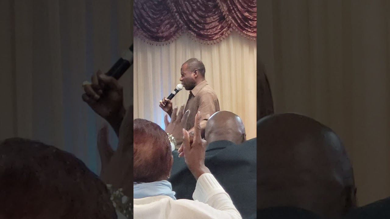 Bishop Robert Kayongo and RPM praying to God to protect the people against the Coronavirus