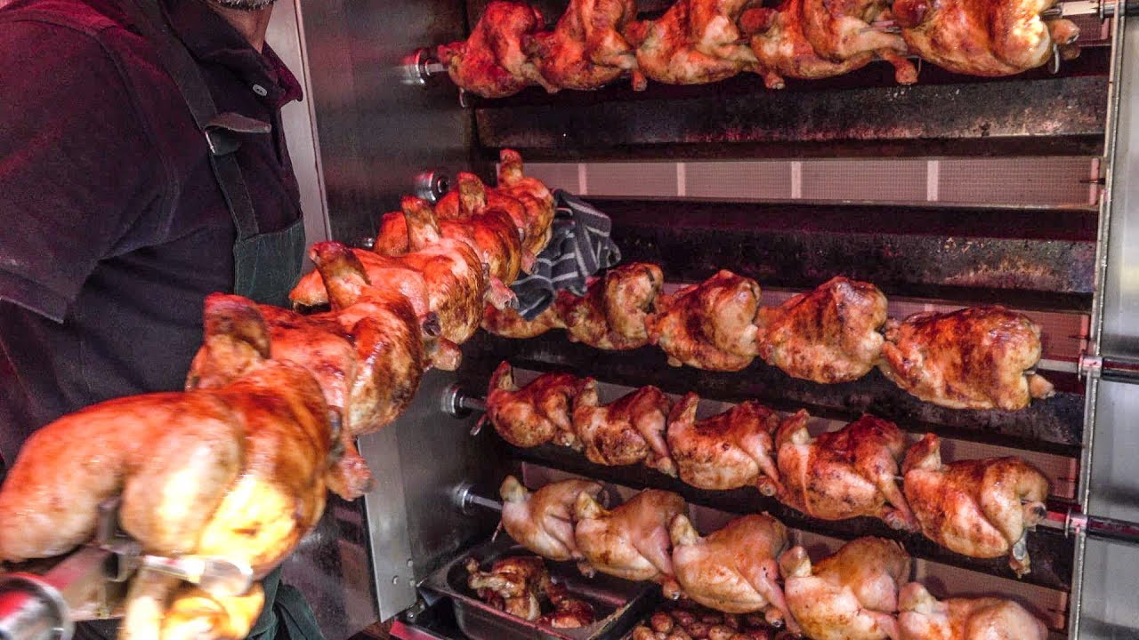 Dozens of Chickens Roasted On The Road. Street Food of London