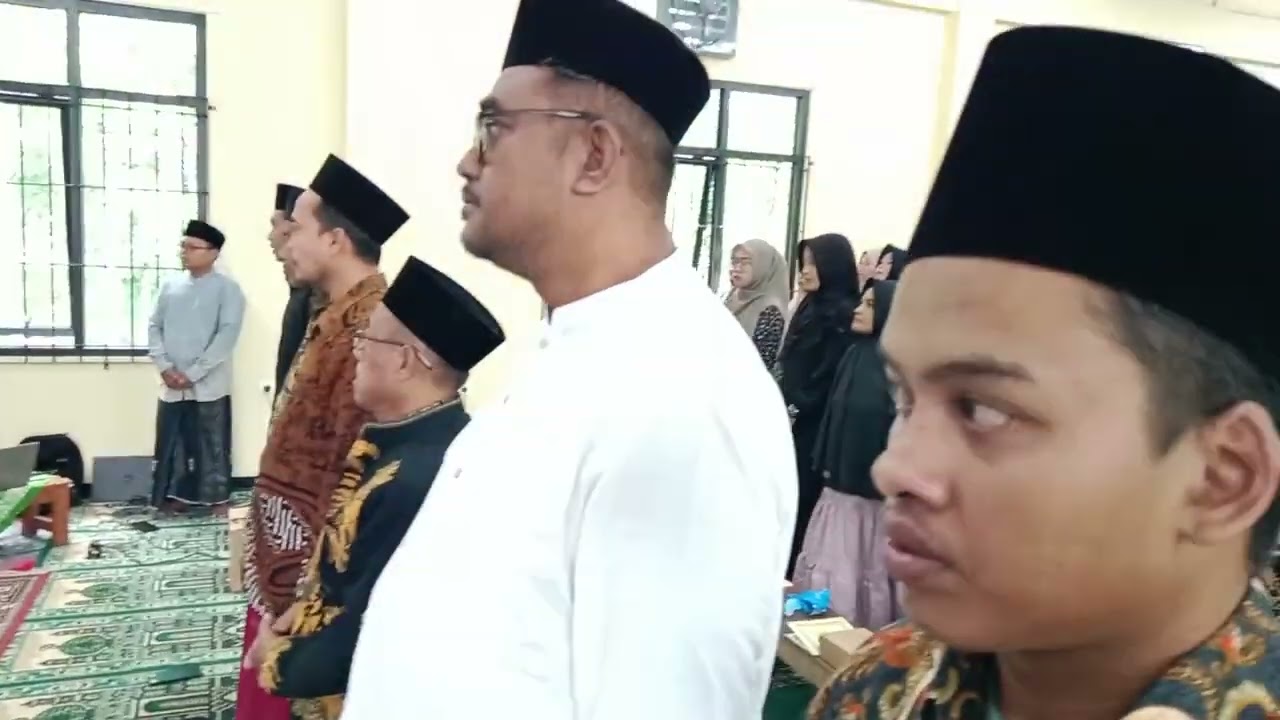 Ustadz Toha, M.Pd.I beserta Istri Mengikuti Seminar Standarisasi Guru Al-Qur'an BMQ At-Tartil Madiun