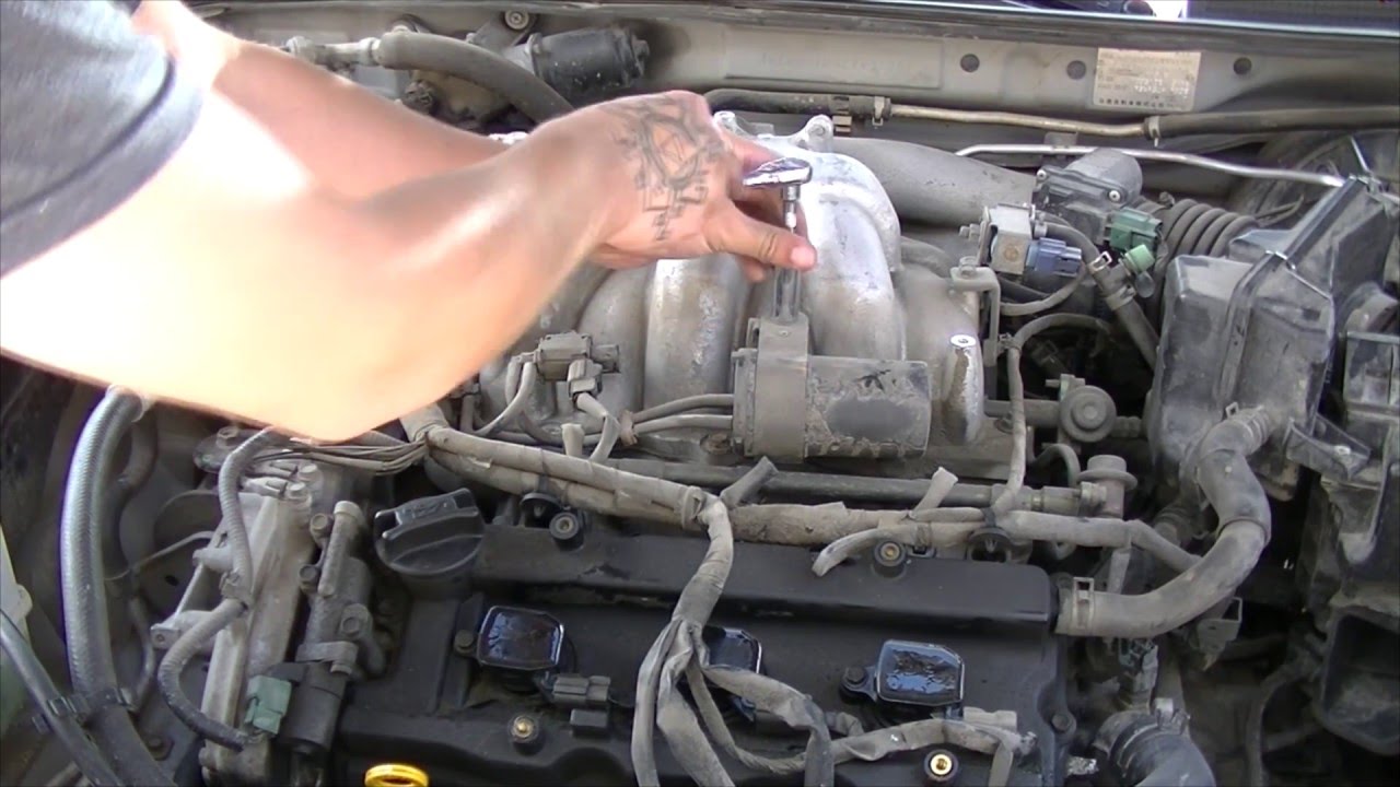 2002 Nissan Maxima: How to replace spark plugs, ignition coils and air intake gasket