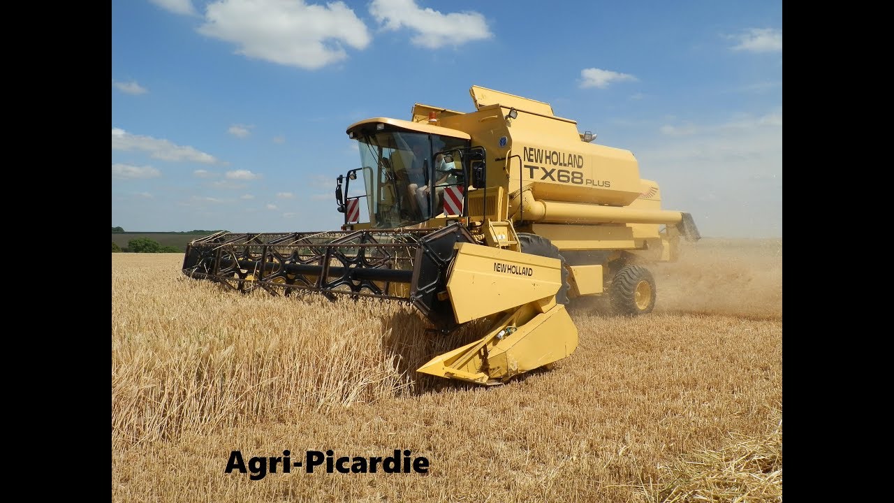Moisson 2017 - New Holland TX 68 Plus - New Holland T7040 x2