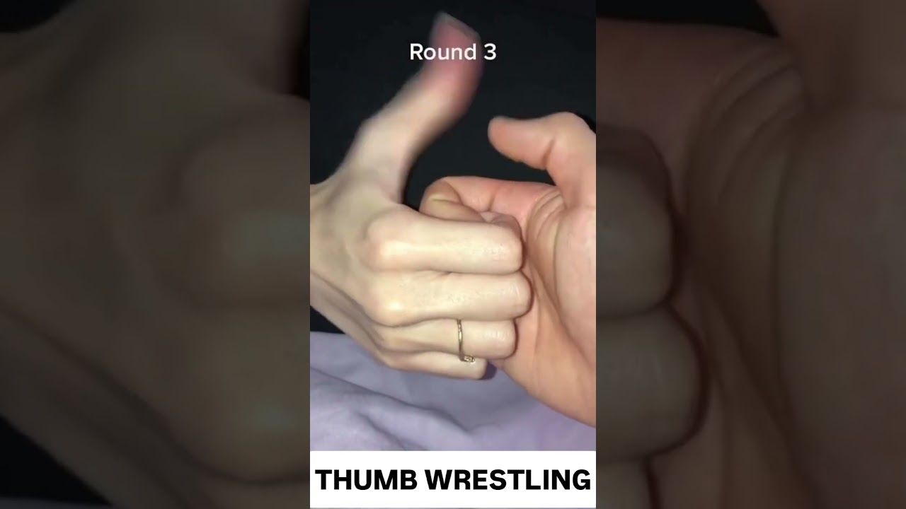 Thumb wrestling with my GF with the score of 2-1 in favor of ME