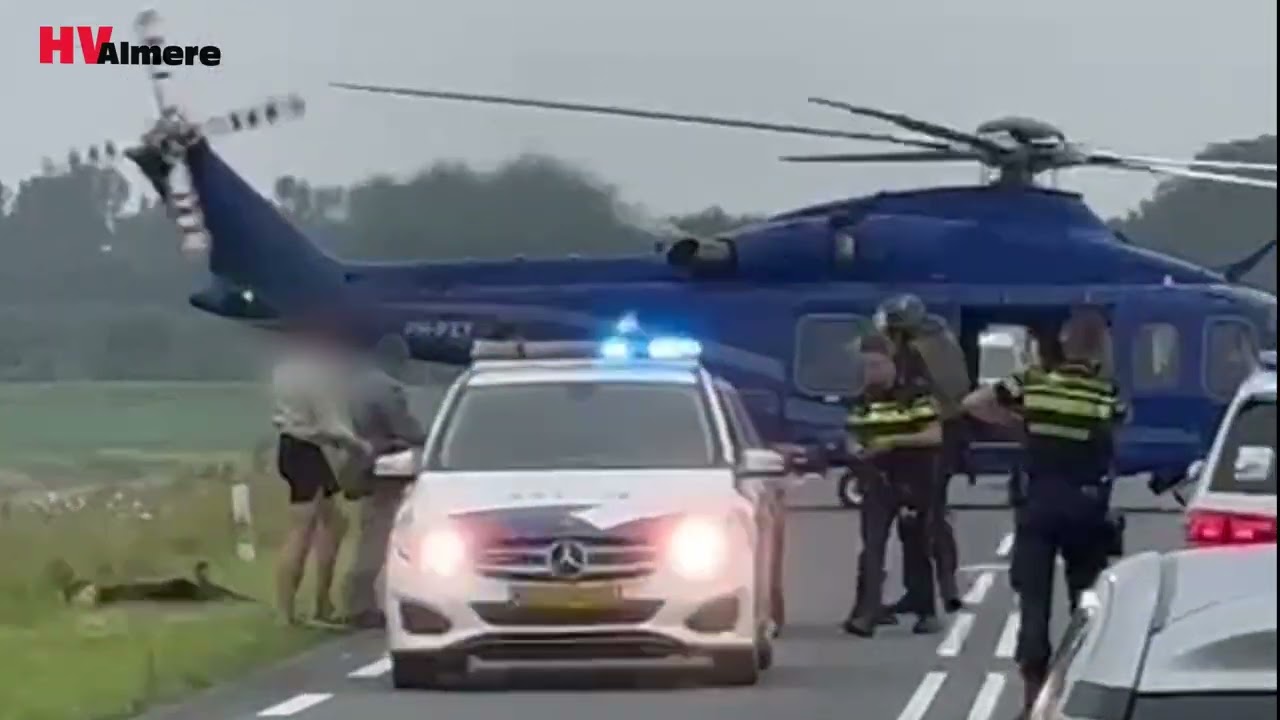 Politieheli landt midden op Oostvaardersdijk om te assisteren bij aanhouding