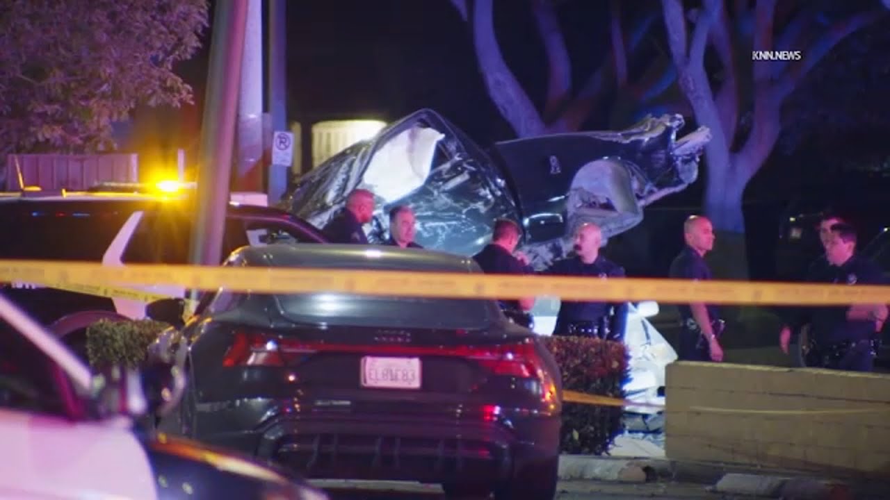 Truck goes airborne, lands on parked cars at end of police chase