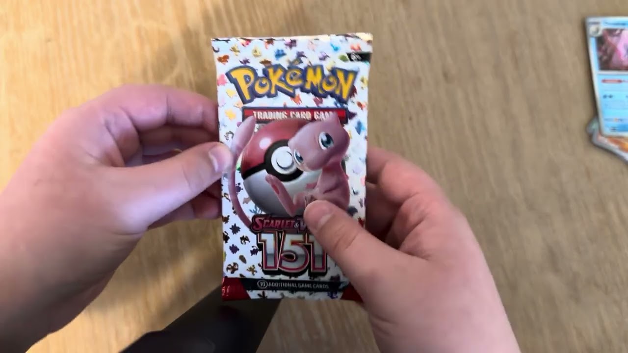 Opening some 151 hoping for that charizard.