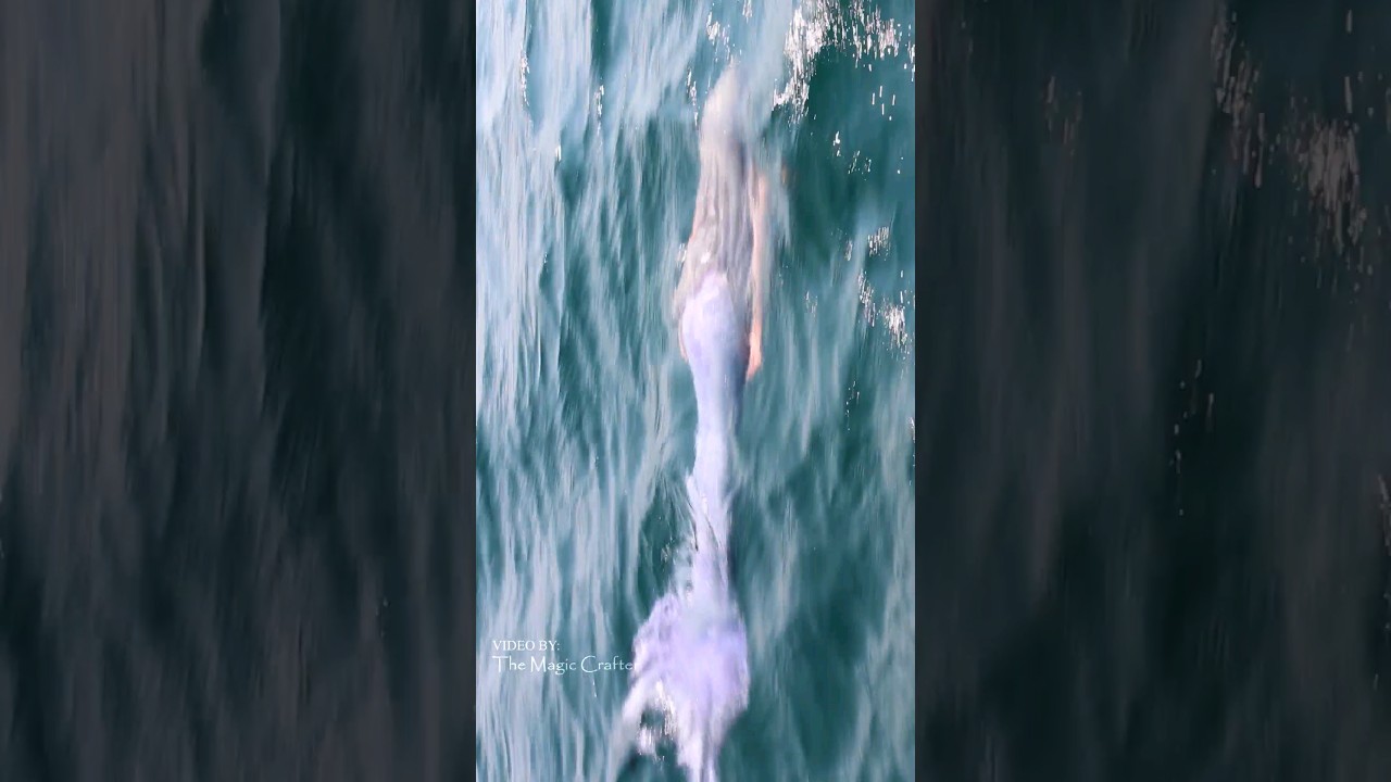 Mermaid swims quickly towards boat (Lake Michigan)