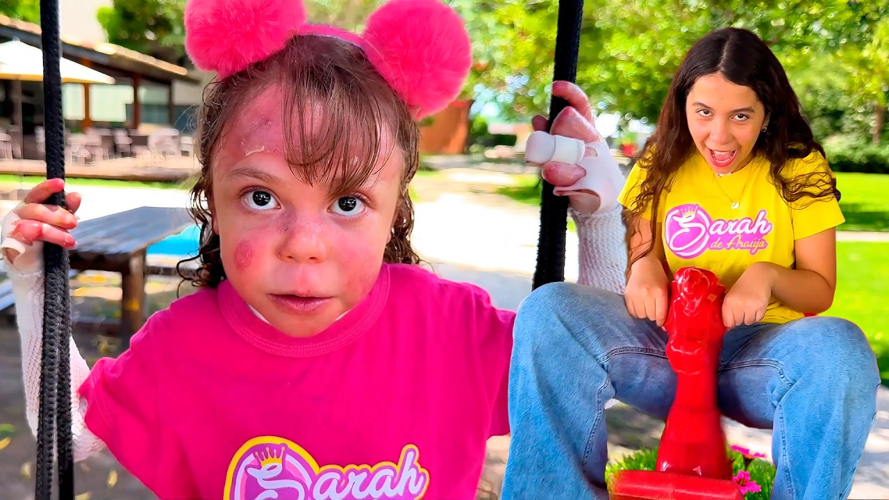 Sarah e Eloah aprendem regras de conduta no parquinho para crianças