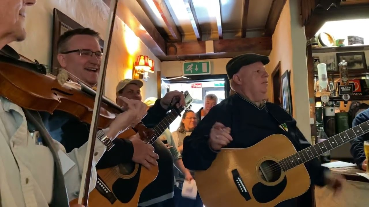 A reenactment of the pub scene in the Quiet Man.  Keanes bar Maam Cross. Pub Runners music tour 2022