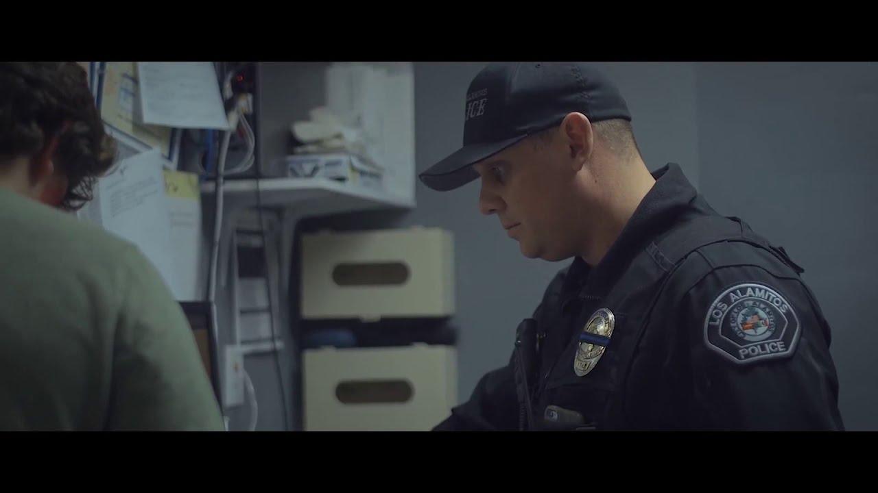 E15M DUI арестовал подростка в наручниках