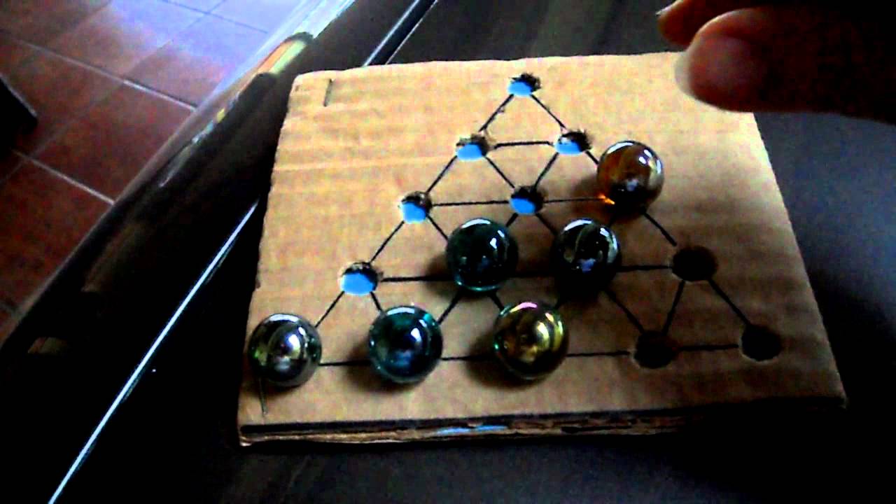Juego de triangulo con bolitas.MP4