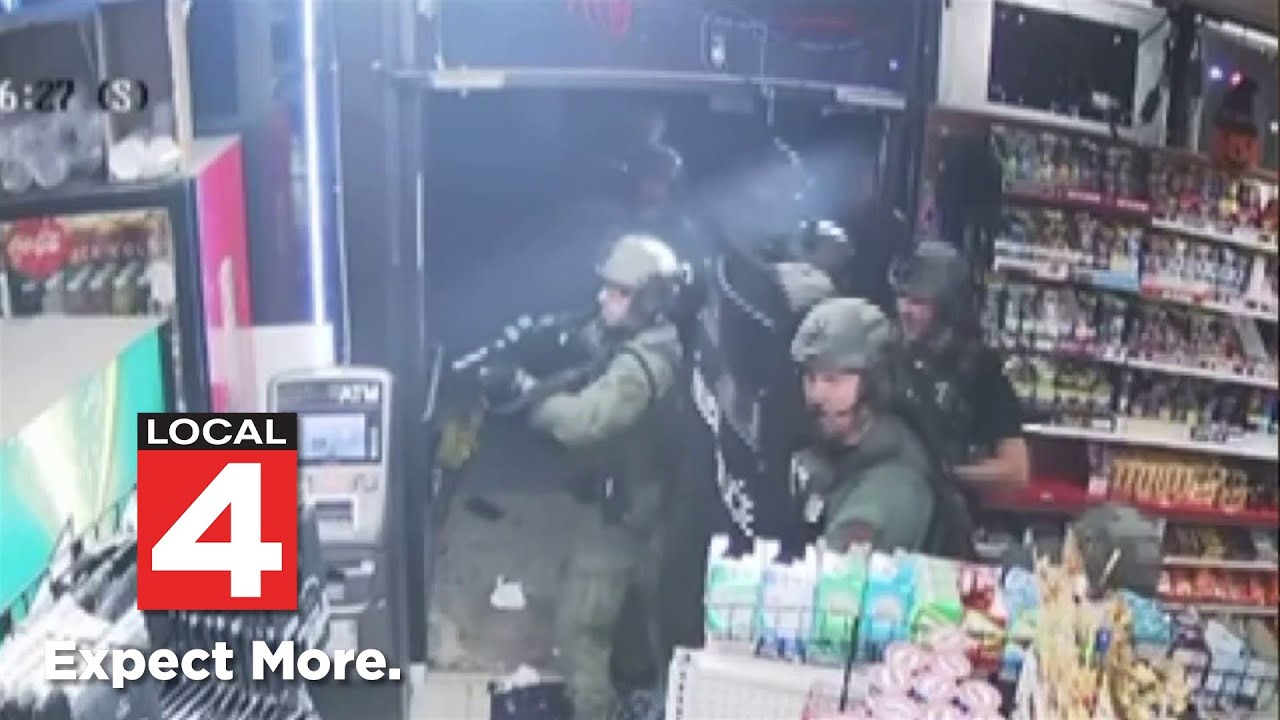 Surveillance video captures standoff at Allen Park gas station