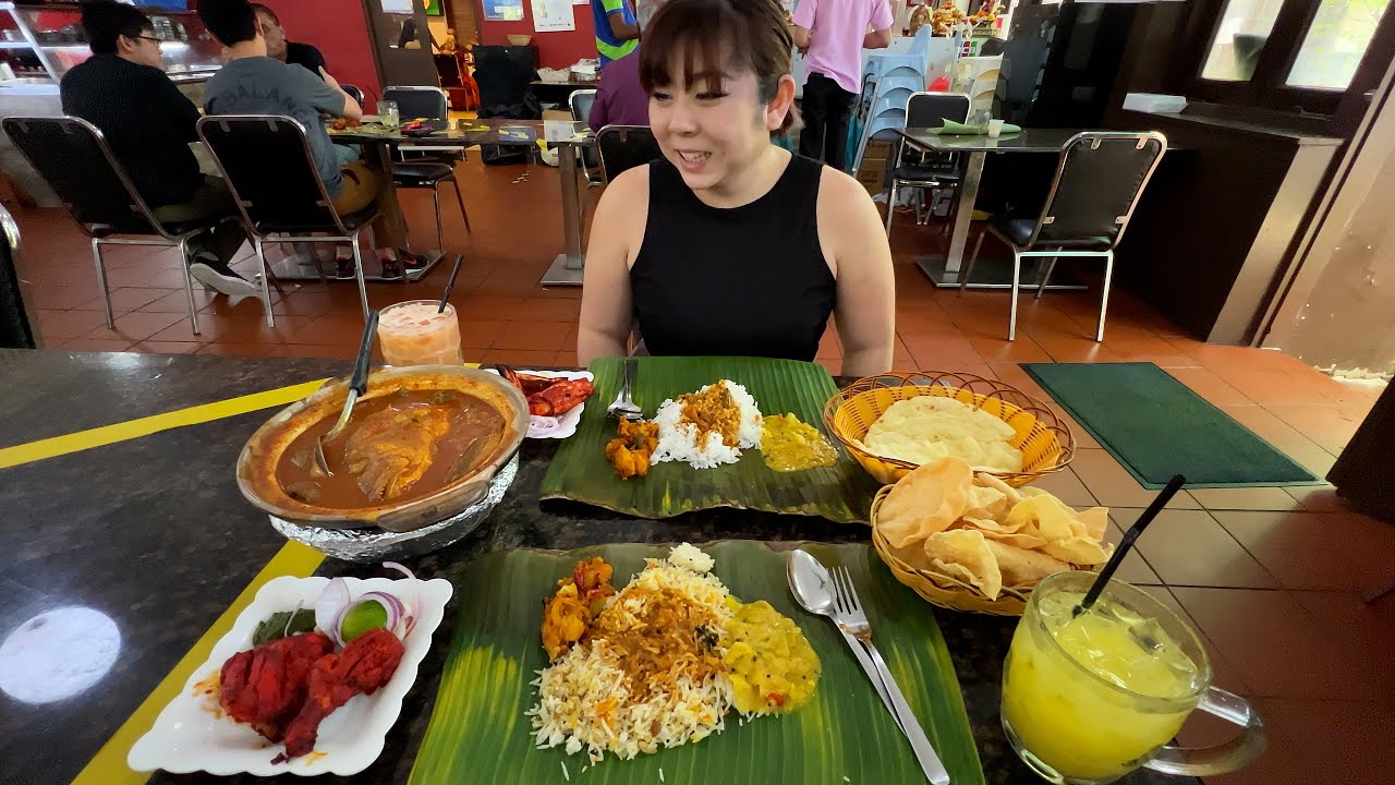 Eating Indian Food - Banana Leaf Platter