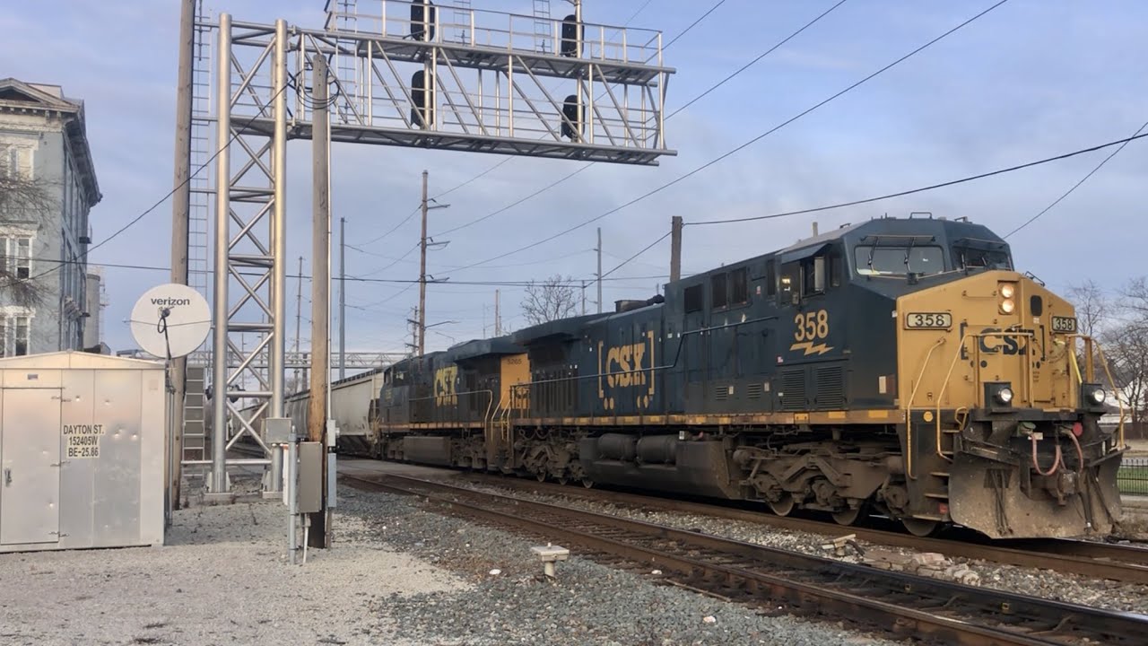 Train Crosses Low Bridge With High Top Coke Cars & Massive CSX Train At Interchange
