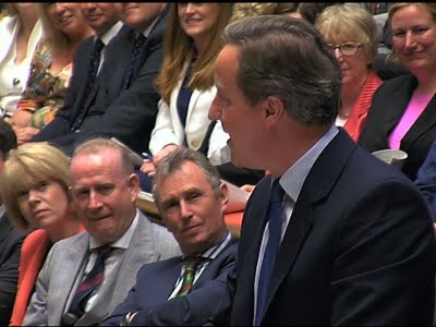 Cameron Receives Standing Ovation in Parliament