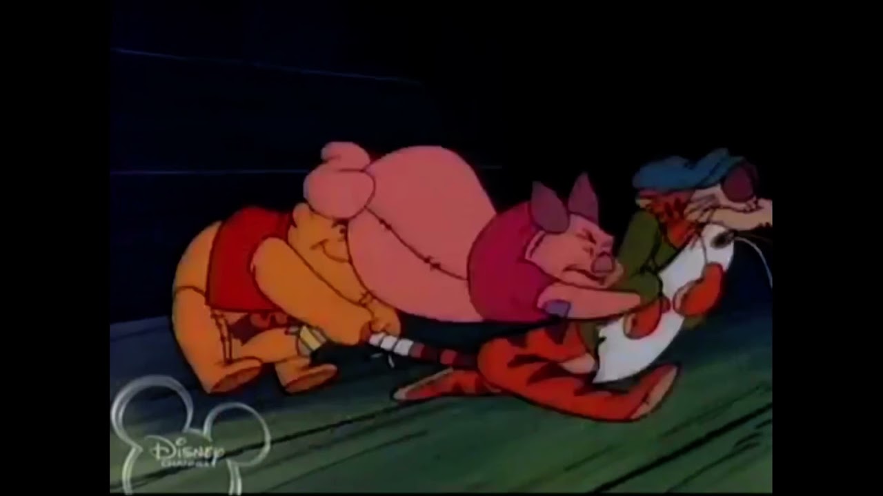Town Pooh tigger and piglet fight over the tag