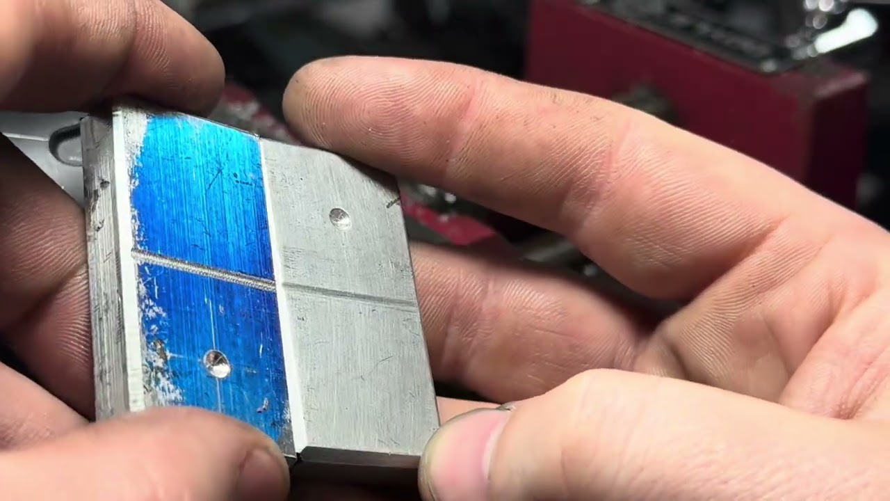 Making aluminum dominoes.