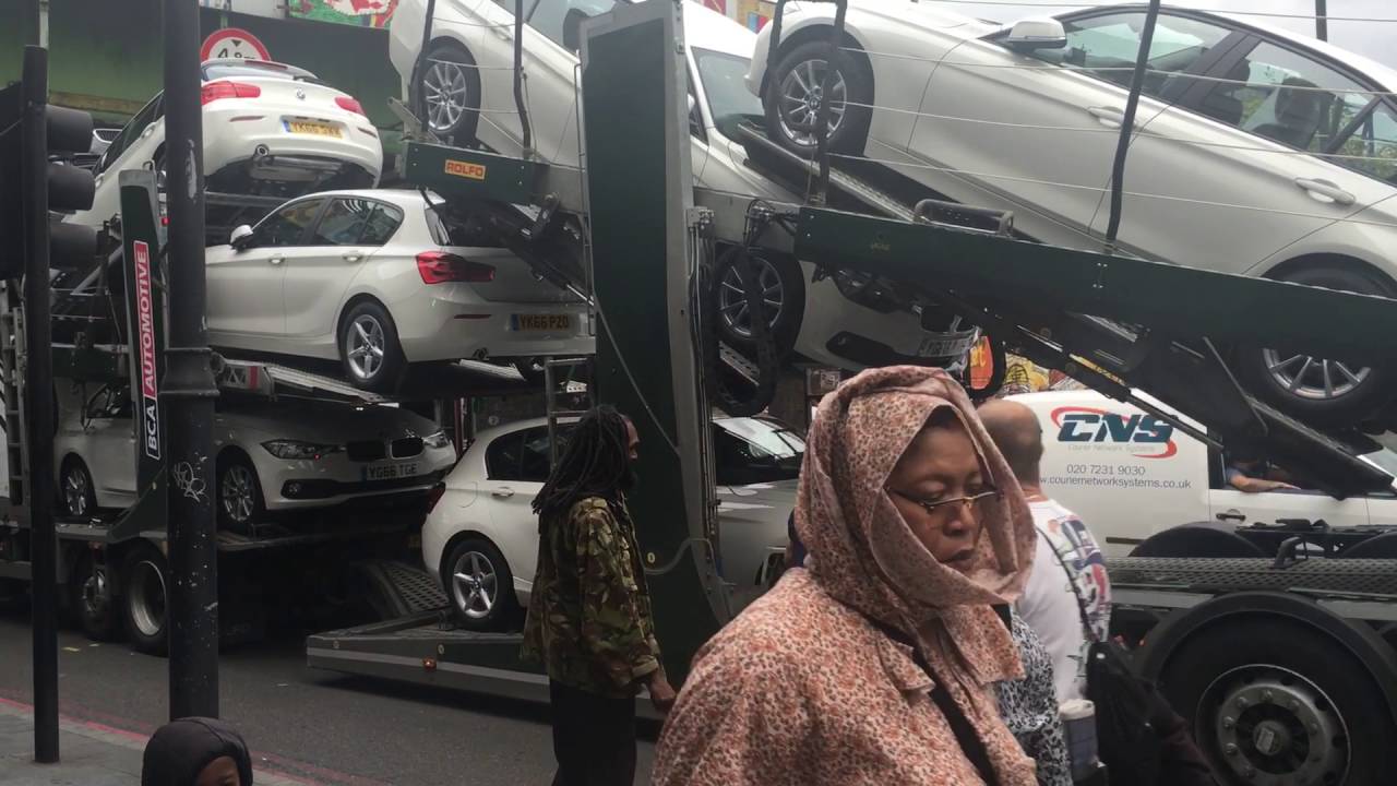 Car transporter can't clear Brixton rd. Railway bridge.