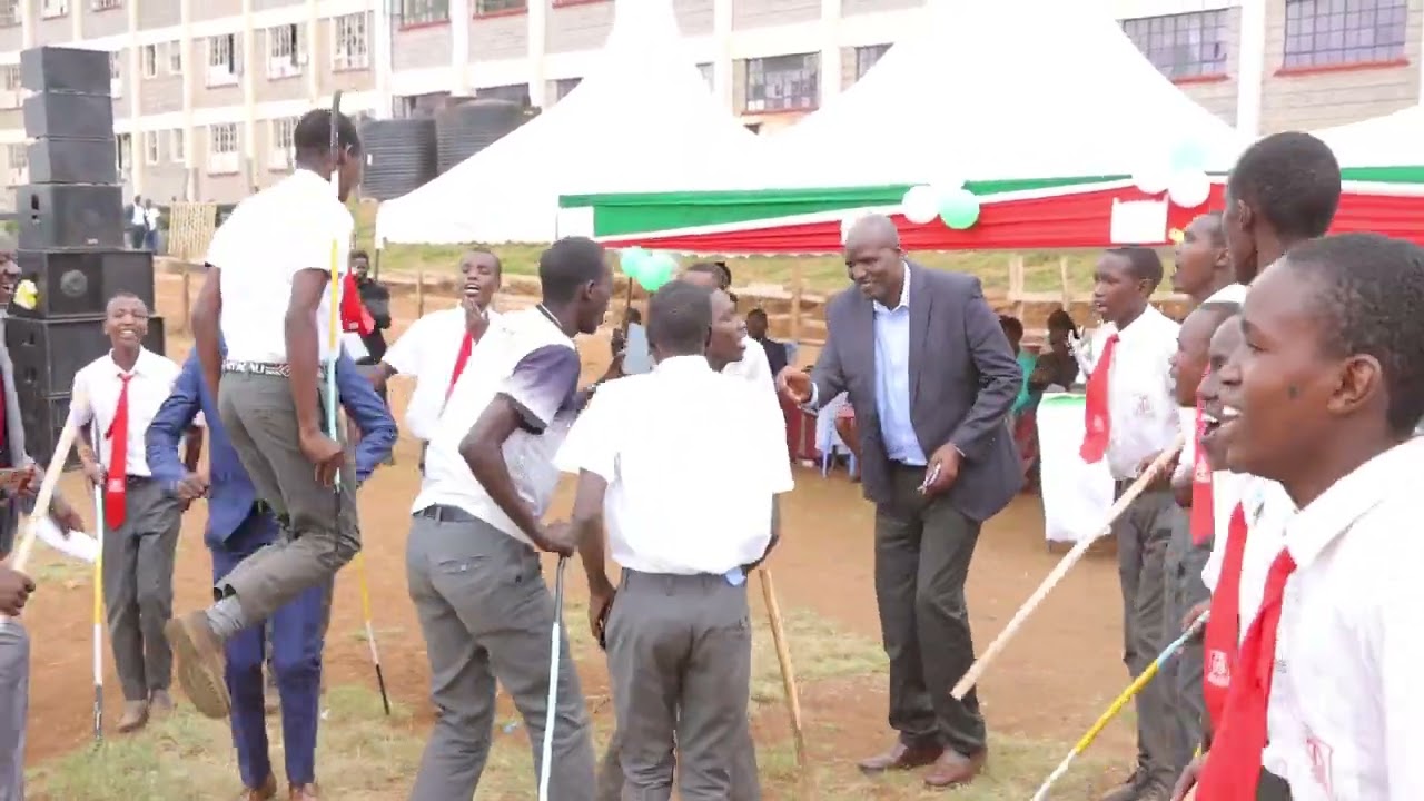 Prize giving at tenwek... on trending maasai boys performing their cultural song.