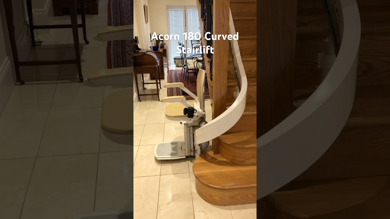 Acorn 180 Curved Stairlift with a 180 degree bottom park. #stairlifts #curvedstairlift
