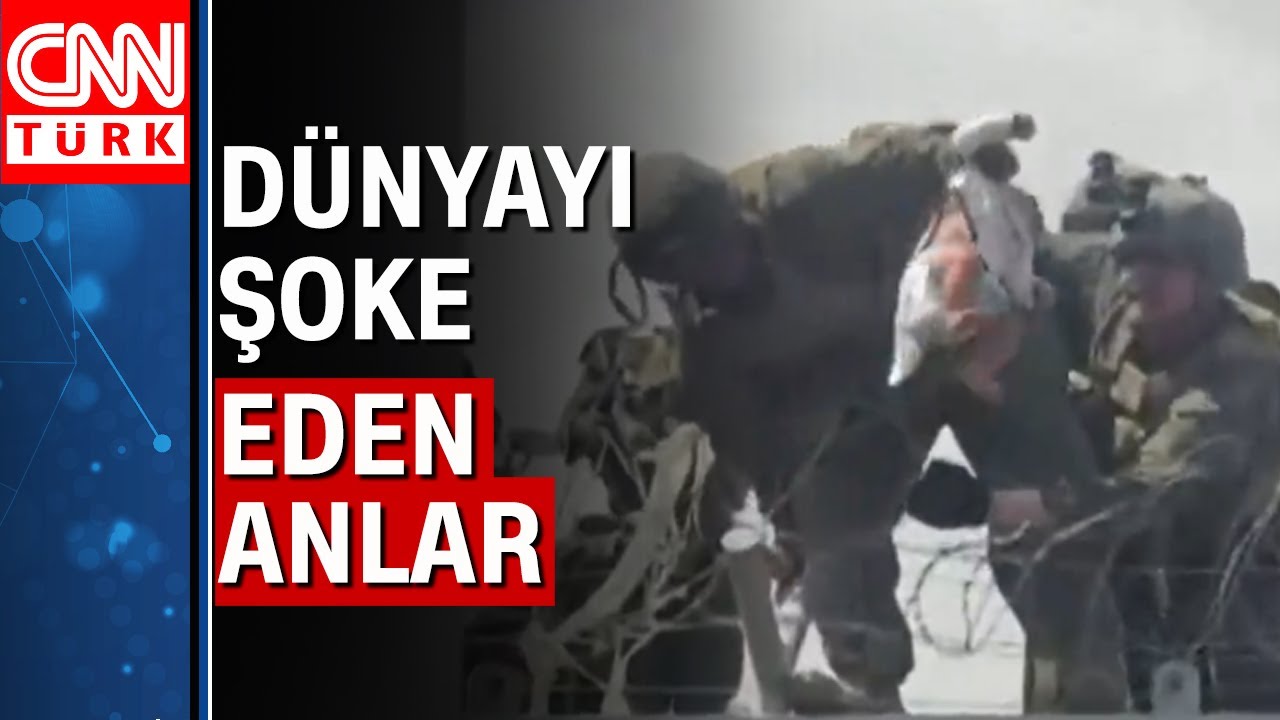 Afganlar bebeklerini Taliban'dan kurtarmak i&ccedil;in dikenli tellerin &uuml;zerinden attı