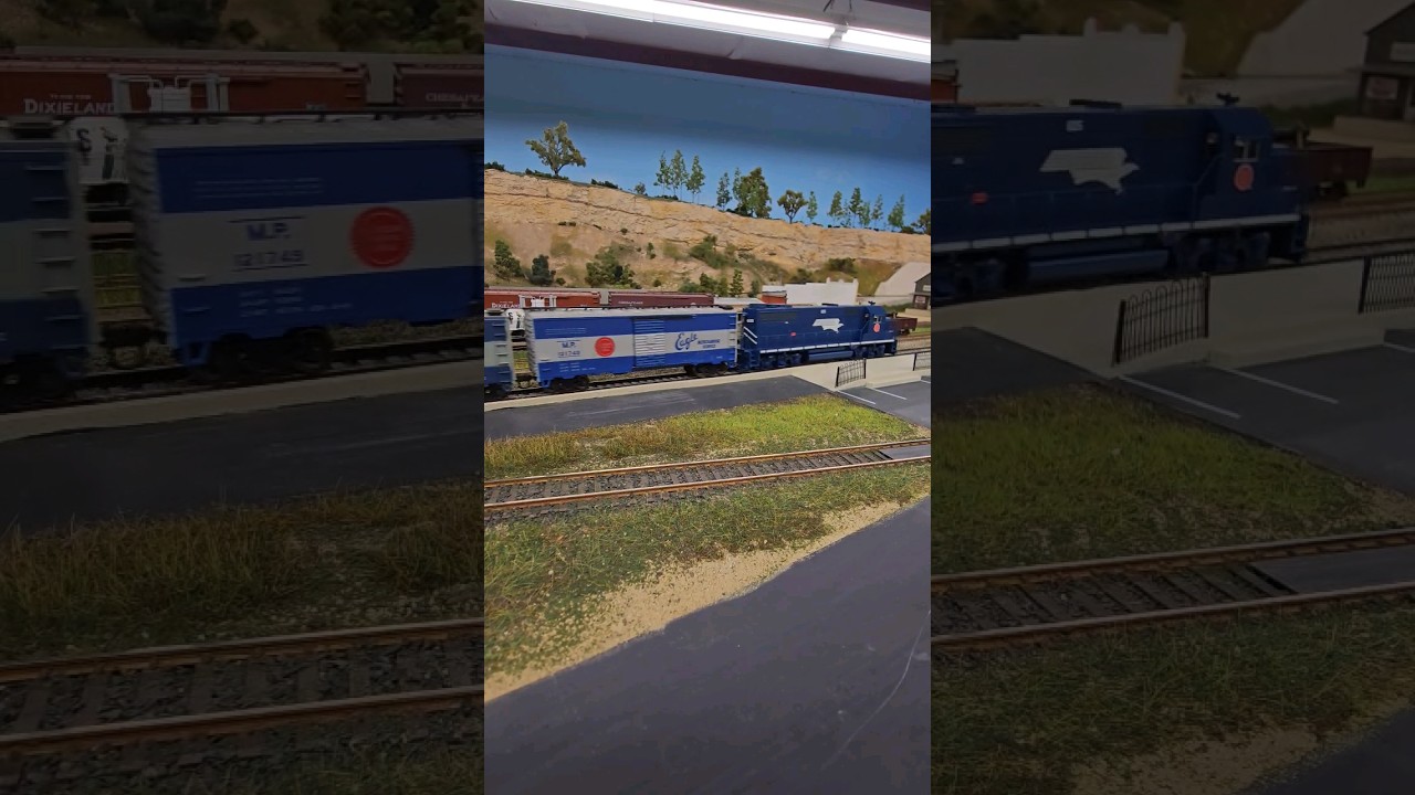 The Missouri Pacific eagle box car special passes the small town #model #railway #fun #missouri #dcc