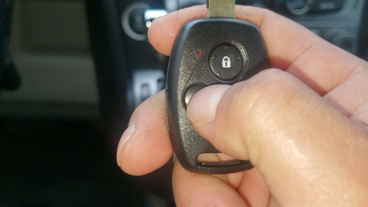 2015 pilot como programar las controles para abrir y cerrar las puertas.