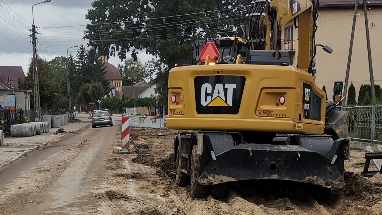 Cat M317F tiltrotator Engcon korytowanie i zasypywanie koryta