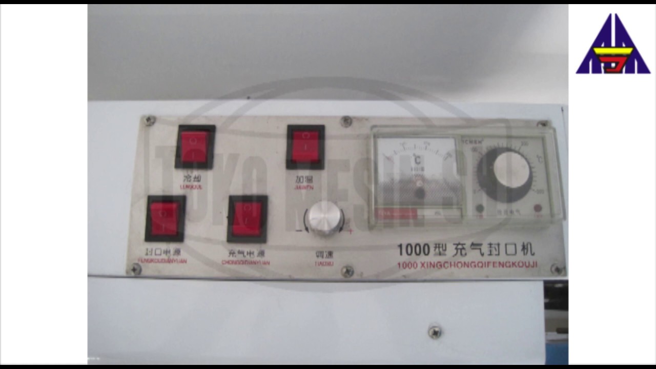 Continous sealer with gas filling type XWY 1000 - Surya Mitra Pack