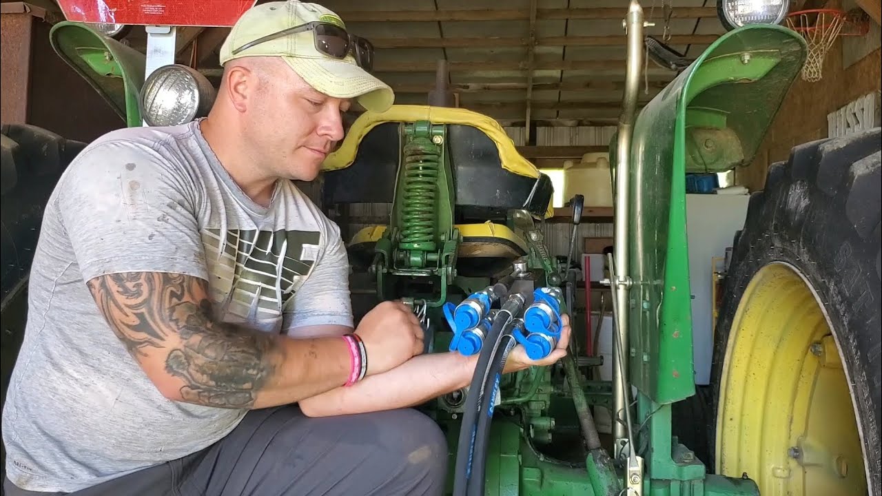 Adding a hydraulic multiplier, or hydraulic diverter. To go from one set of rear remotes to two!!!