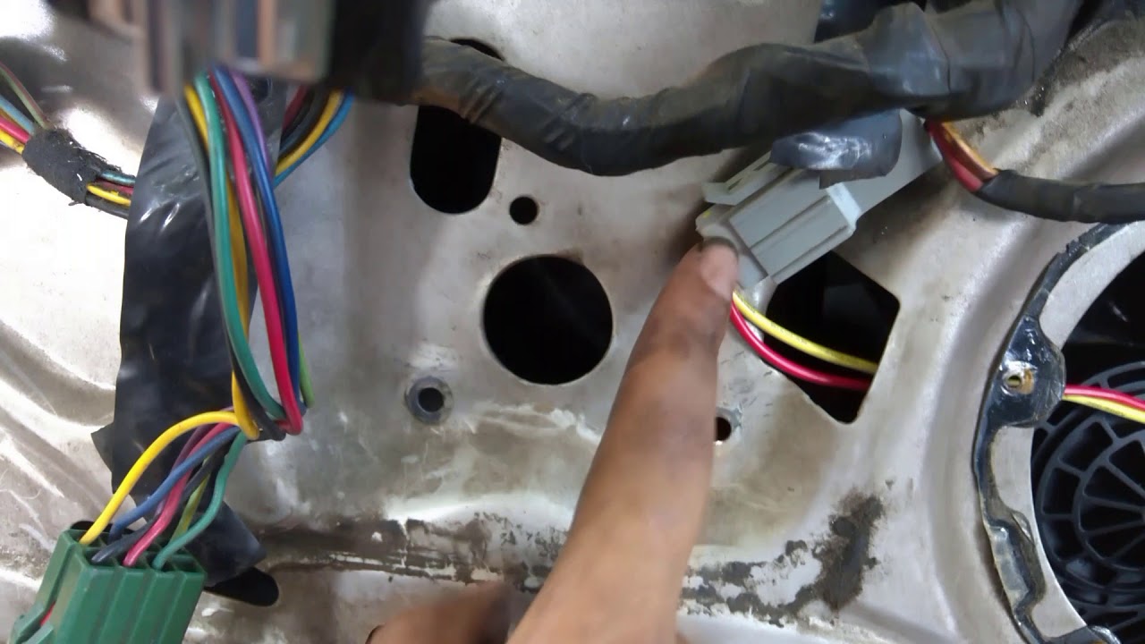 How to Replace Front Door Window Motor in a 1981-1989 Lincoln Town Car