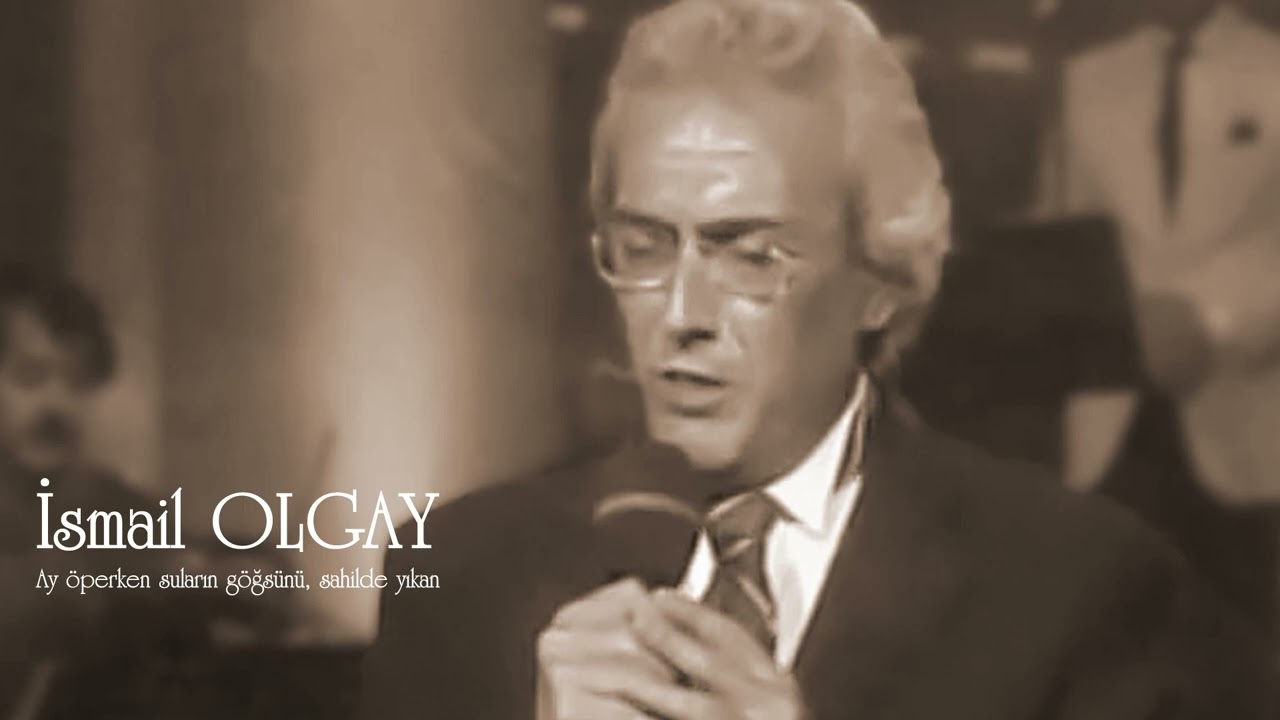 İsmail Olgay ~ Ay öperken suların göğsünü sahilde yıkan