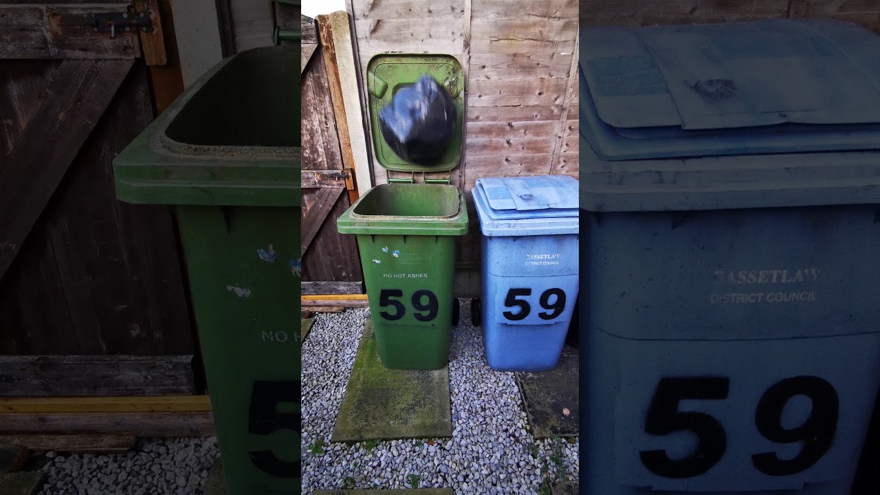 (4K 30FPS) Throwing rubbish/trash/garbage in a green bin