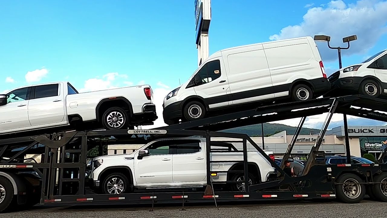 LOADING 2024 GMC & FORD VEHICLES /  2018 PETERBILT / COTTRELL TRAILER / AUTO TRANSPORT CARRIER #16