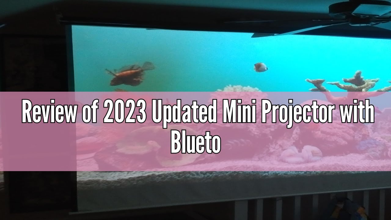 Review 2023 Mini Projector HI-04 with Bluetooth and Projector Screen, 9500Lumens Full HD 1080P