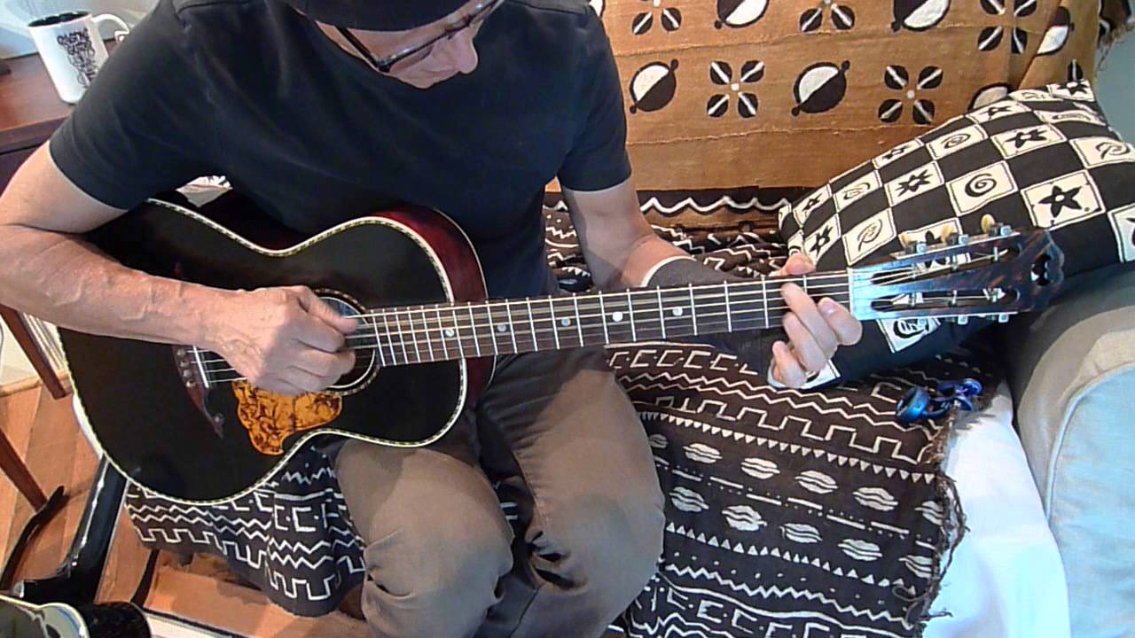 Black guitar, black cast.   Fraulini Annunziata.