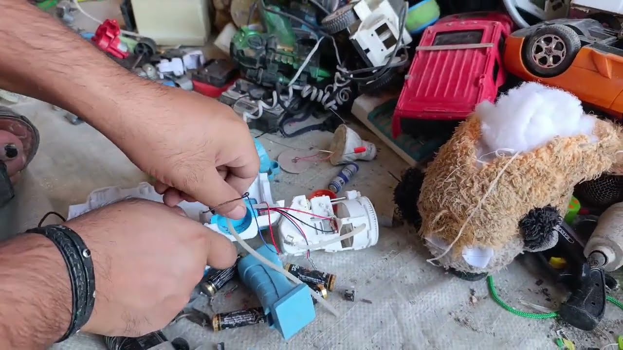 Opening the weird boomerang gun and watching it work.