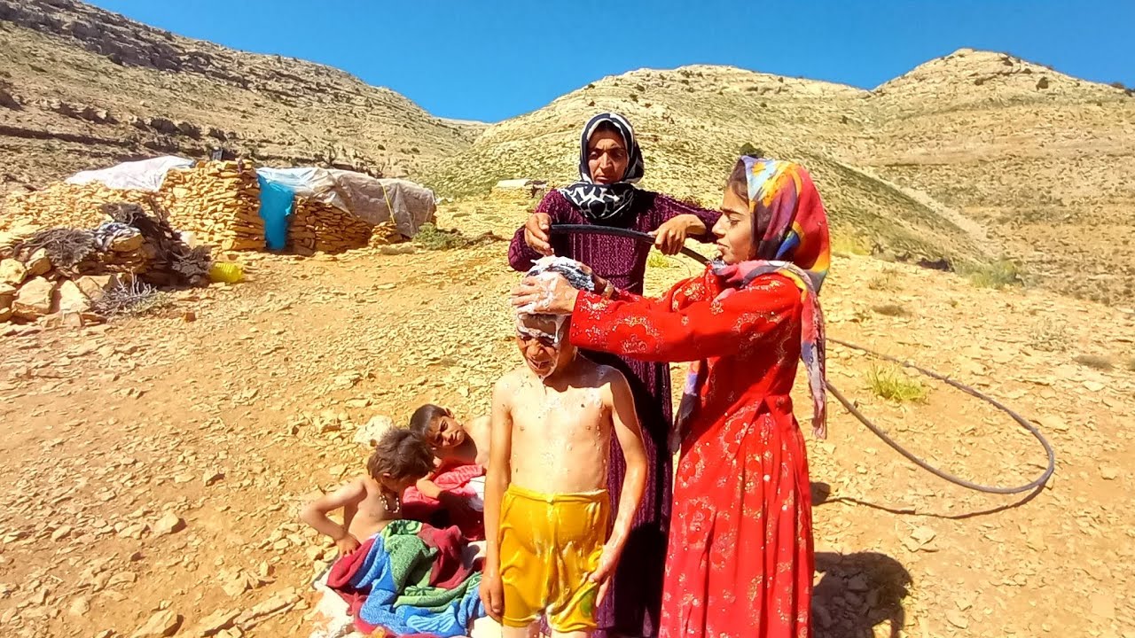 Iranian nomads bathing in harsh conditions in Sardsir