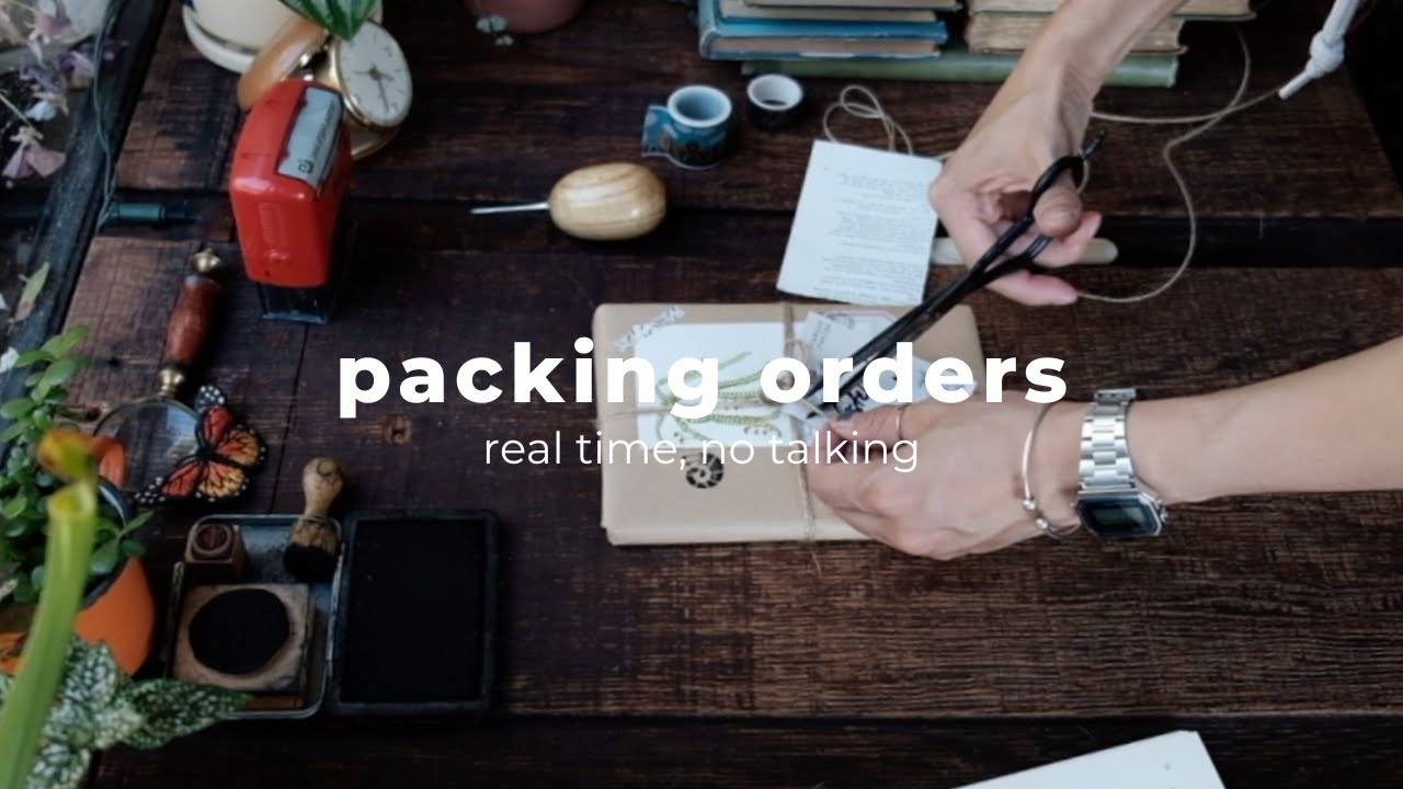 pack orders with kraft paper - arms process of order packaging, no mid-roll ads
