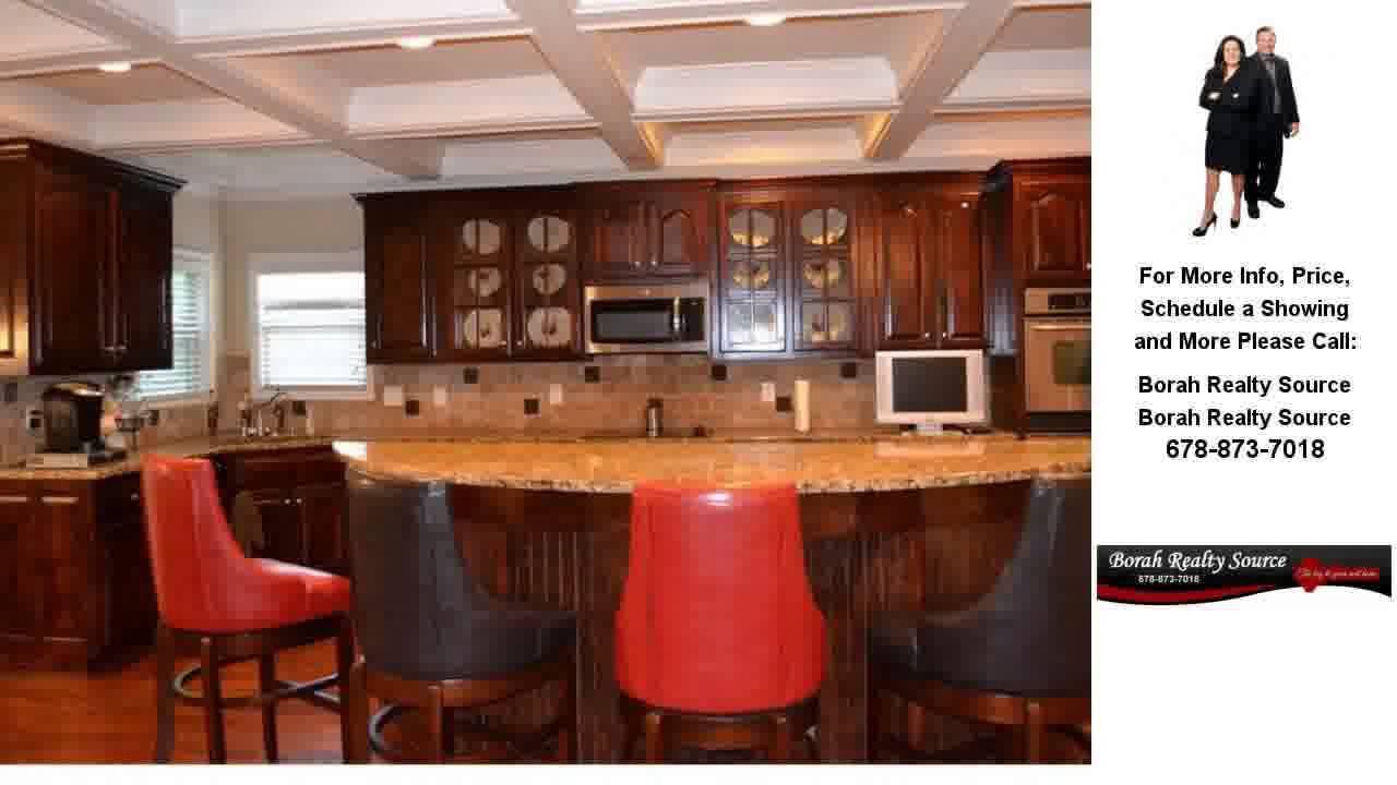 3266 Dolostone Way, Dacula, GA Presented by Borah Realty Source.