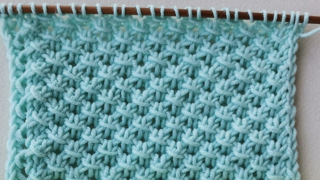 Punto a rombi traforati. Punto a maglia per copertine, stole, sciarpe, canotte estive, cardigan.
